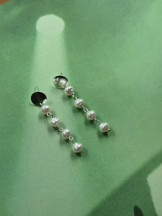 Aretes perla
